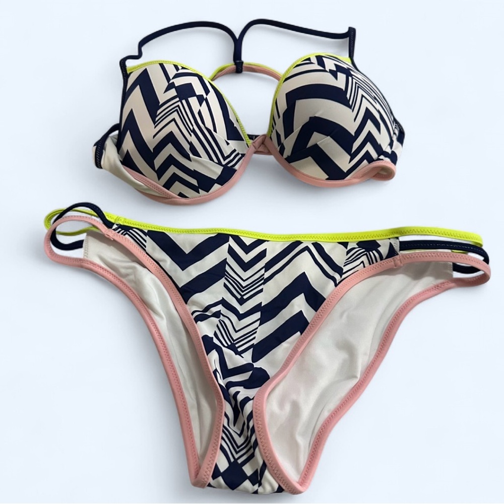 Victoria’s Secret Bikini. Top is Size 34C. TWO Bottoms are both size Large.